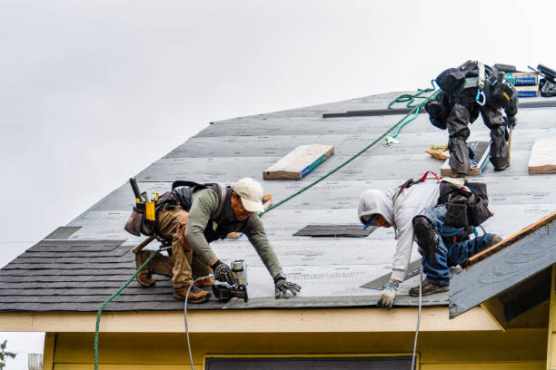 Professional Roofing technician working in Linden, CA
